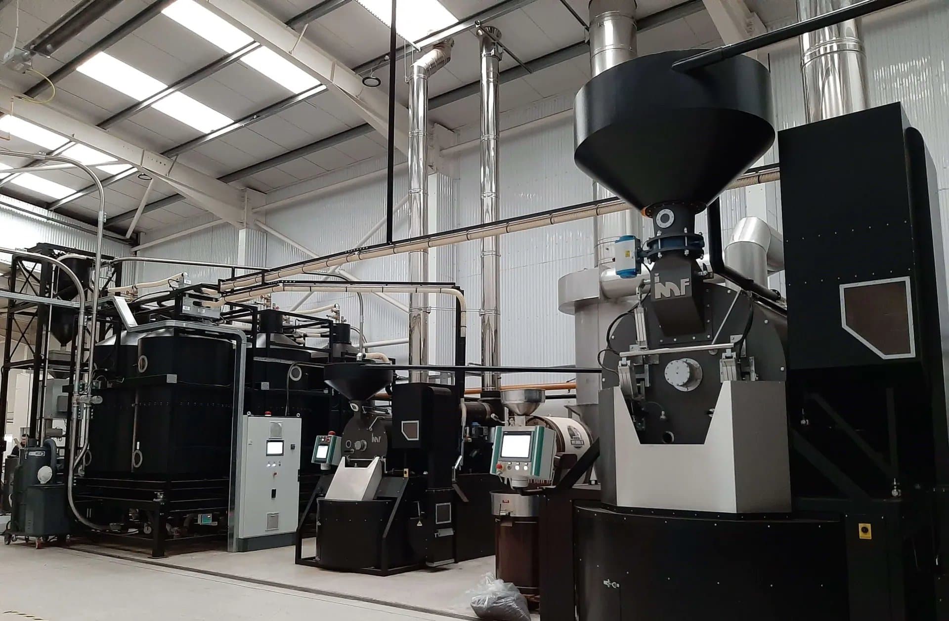 A row of roasters at Clady Group's production facility